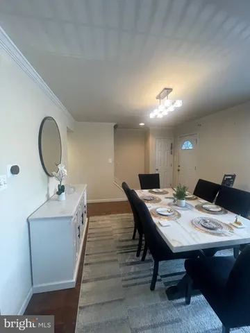 a view of a workspace with furniture