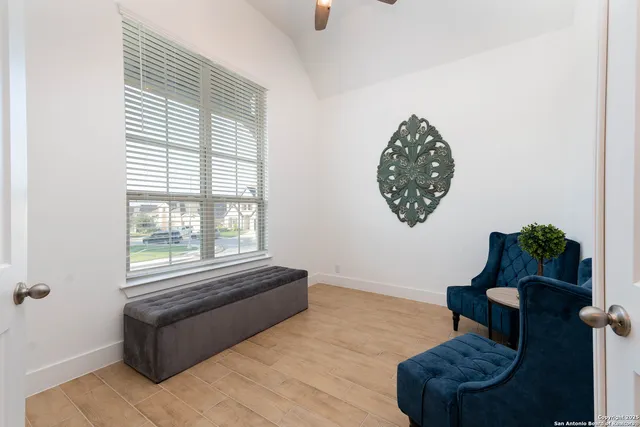 a living room with furniture and a window
