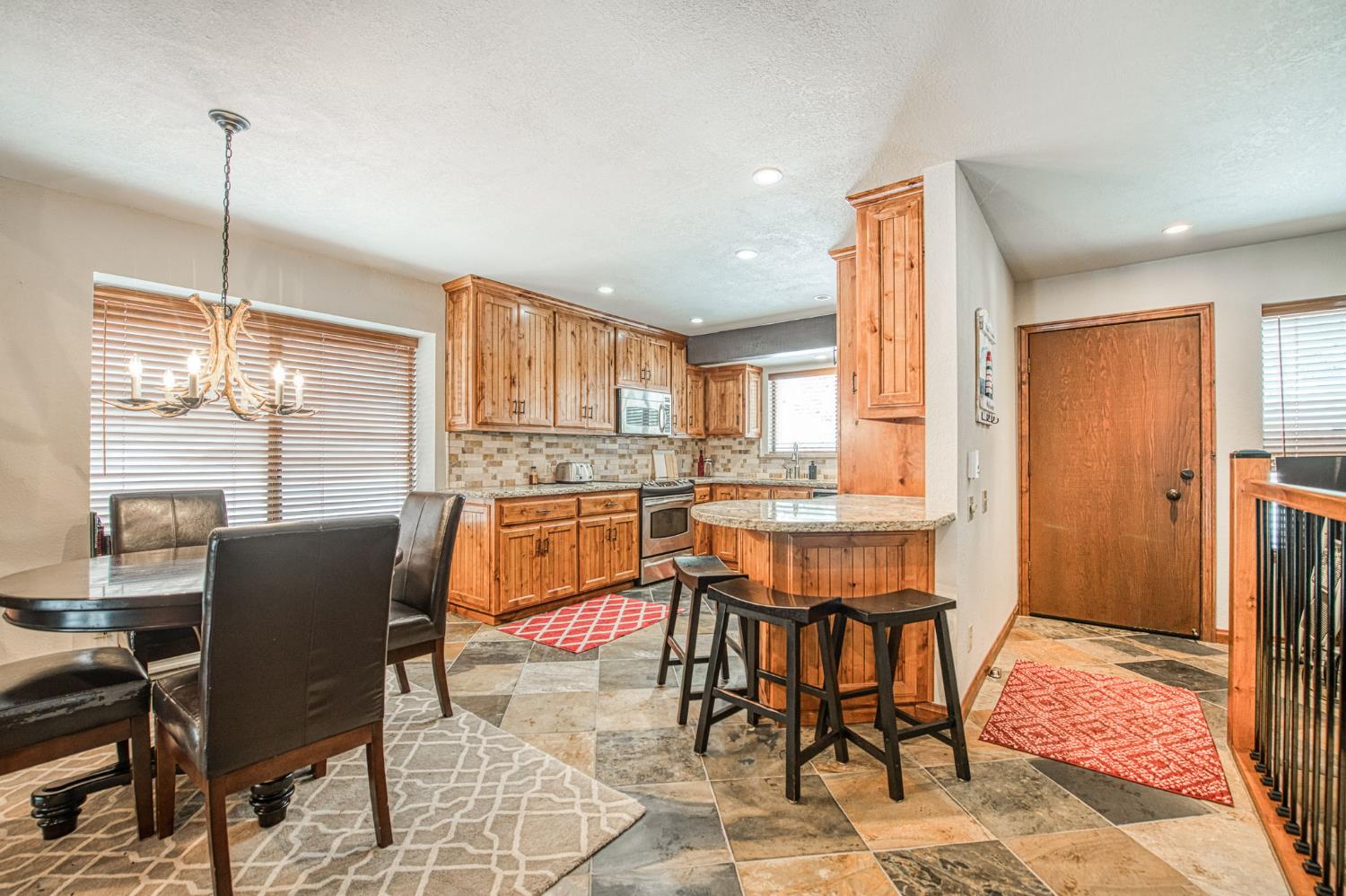 62687 Huntington Vista Road, Unit 114 Mono Hot Springs, CA 93642 - Photo 2 of 23 a dining room with furniture and window
