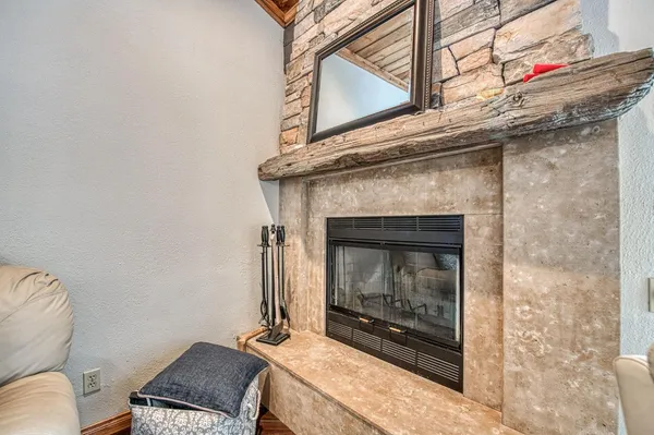 a living room with a fireplace