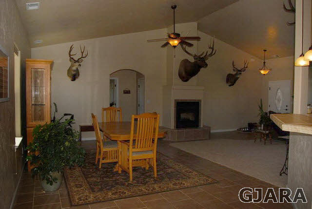 2003 Roma Avenue Fruita, CO 81521 - Photo 6 of 23 a dining room with furniture and window