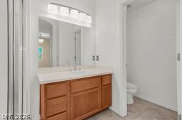 7701 West Robindale Road, Unit 277 Las Vegas, NV 89113 - Photo 17 of 33 An inviting bathroom offers a well-lit vanity with ample storage.