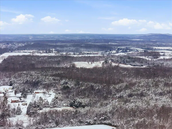 a view of a lake with mountains in the background