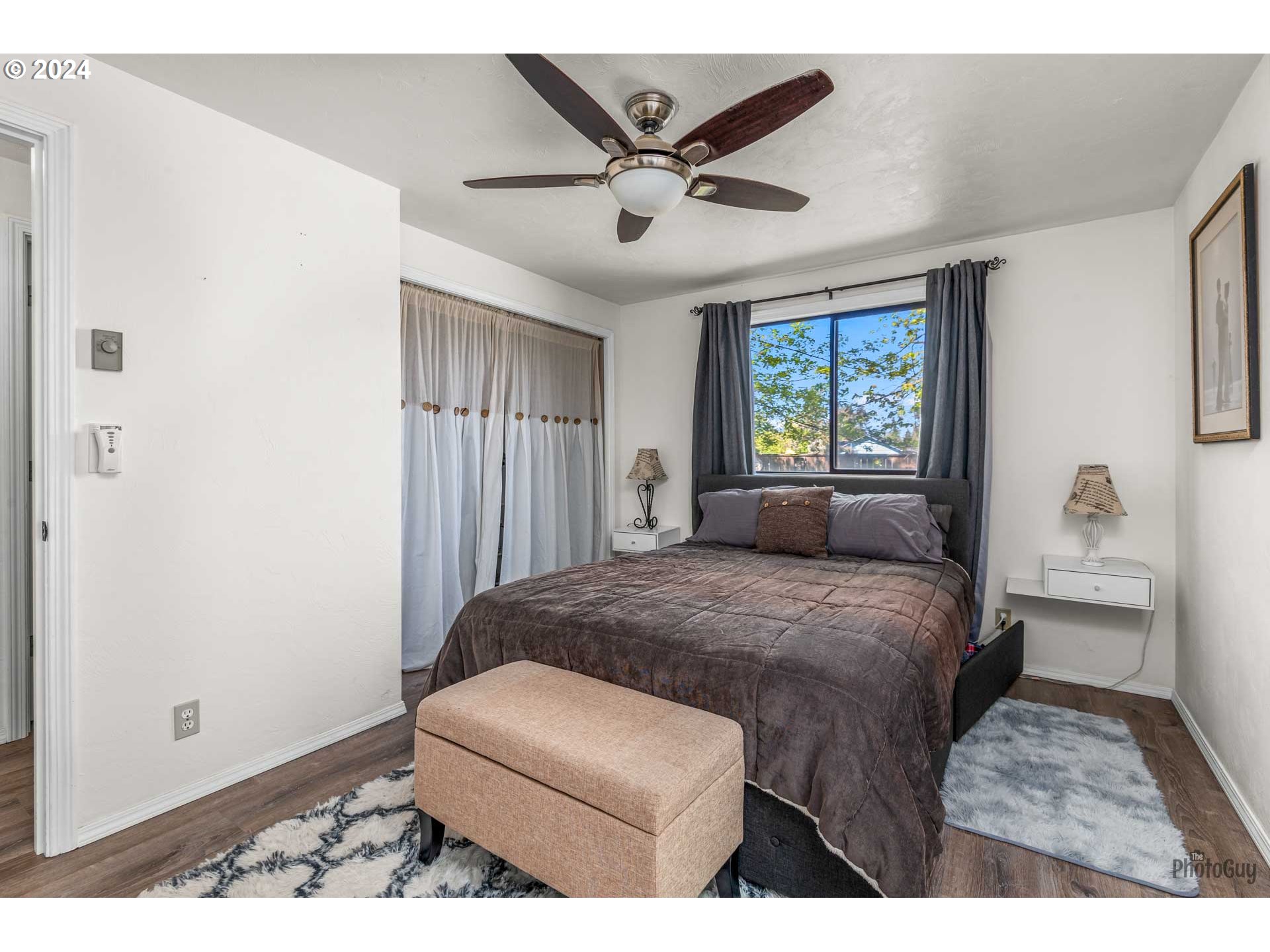666 56th Street Springfield, OR 97478 - Photo 15 of 31 a bedroom with a bed and window