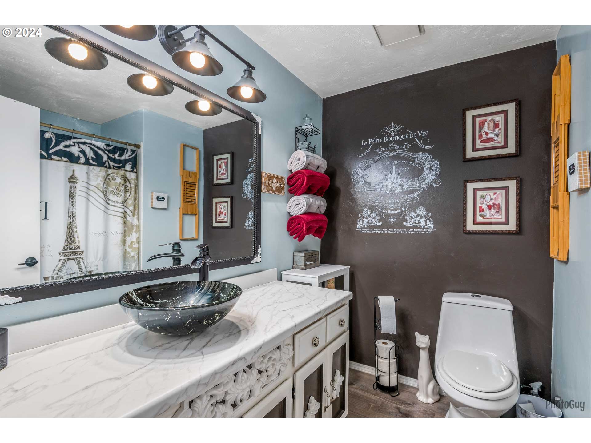 666 56th Street Springfield, OR 97478 - Photo 23 of 31 a bathroom with a sink mirror vanity and toilet