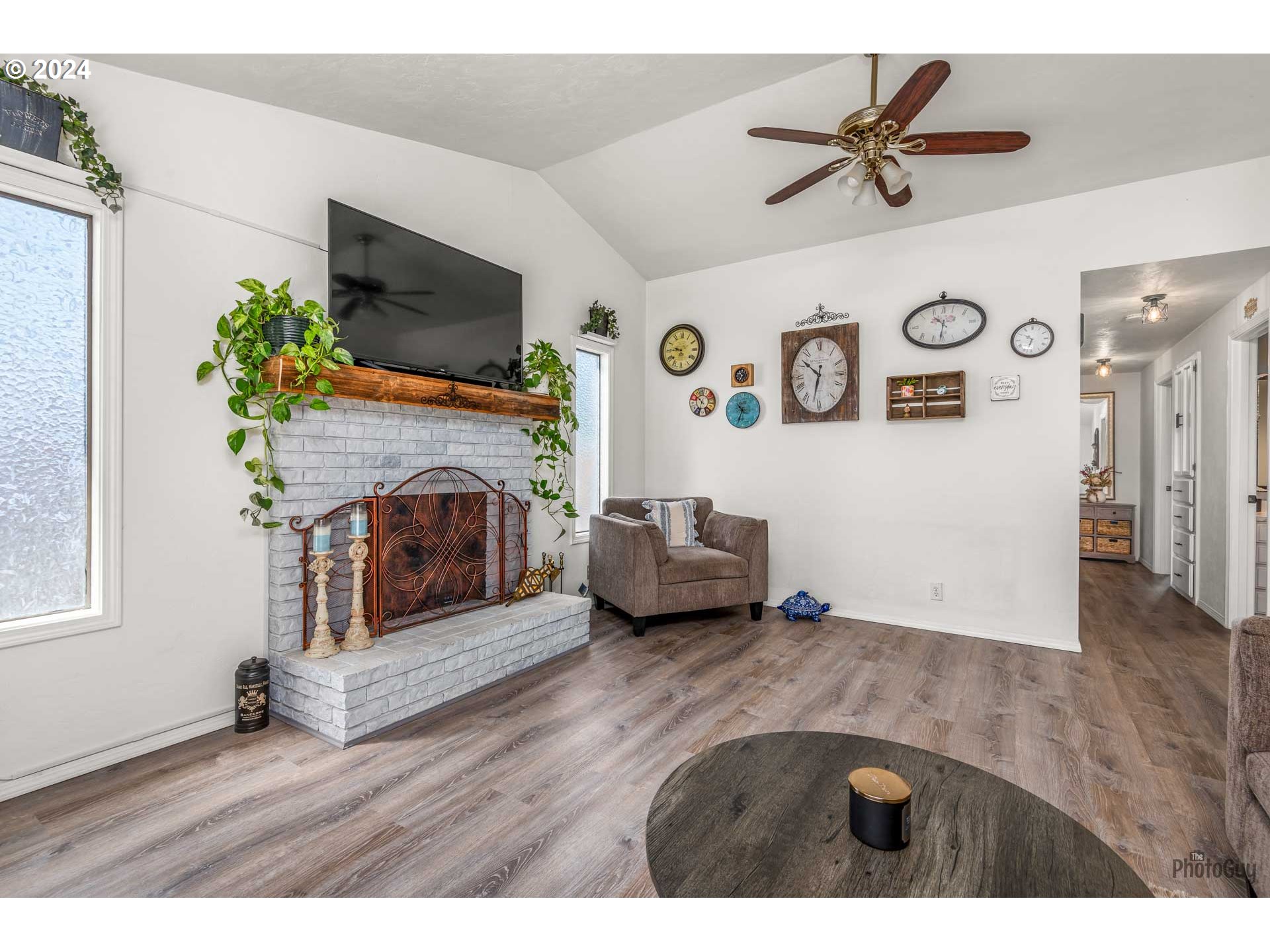 666 56th Street Springfield, OR 97478 - Photo 8 of 31 a living room with furniture and a fireplace