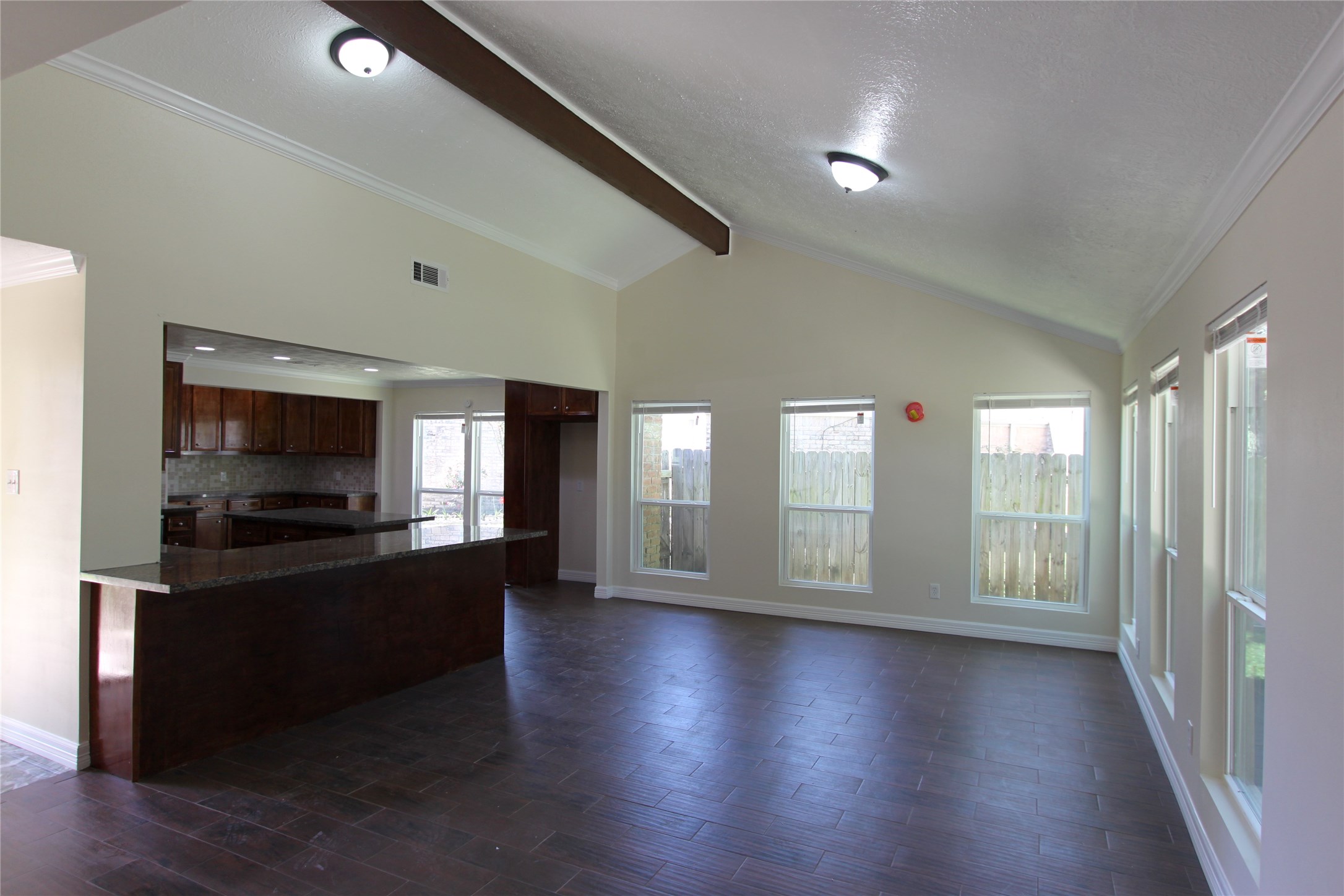 4330 Regency Villa Drive Houston, TX 77084 - Photo 2 of 13 a view of a living room with hardwood floor and a flat screen tv