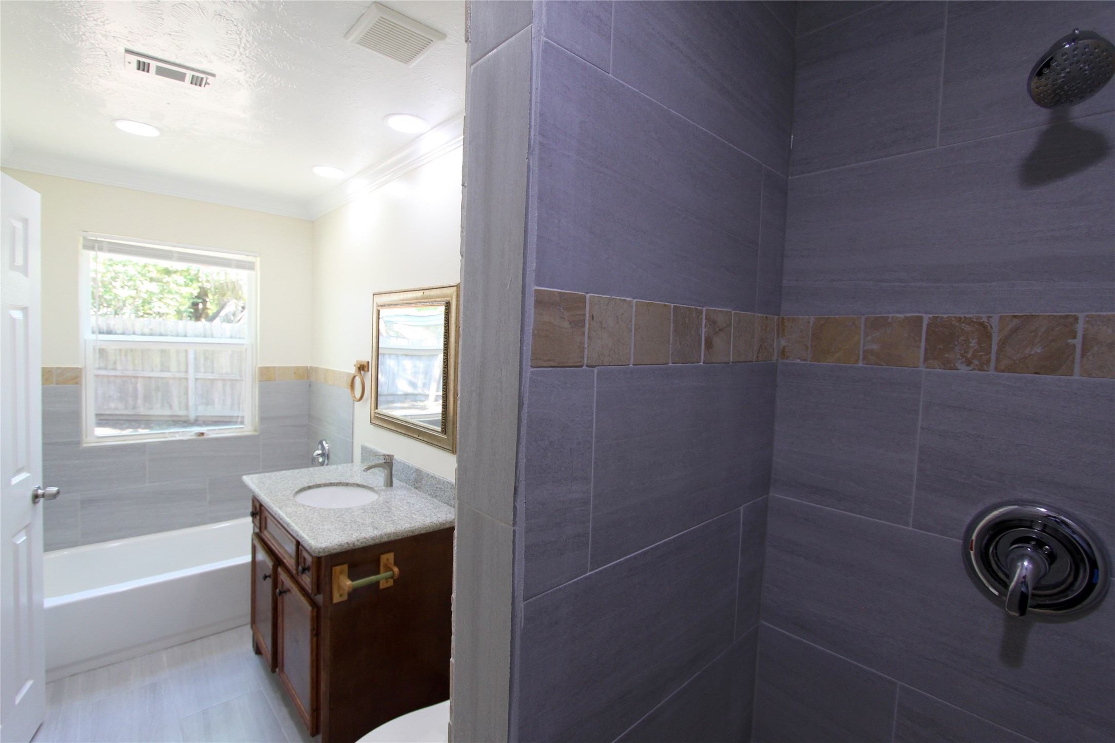 4330 Regency Villa Drive Houston, TX 77084 - Photo 8 of 13 a bathroom with a sink a toilet and shower