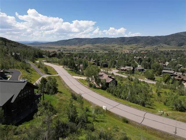 a view of a city street from a balcony