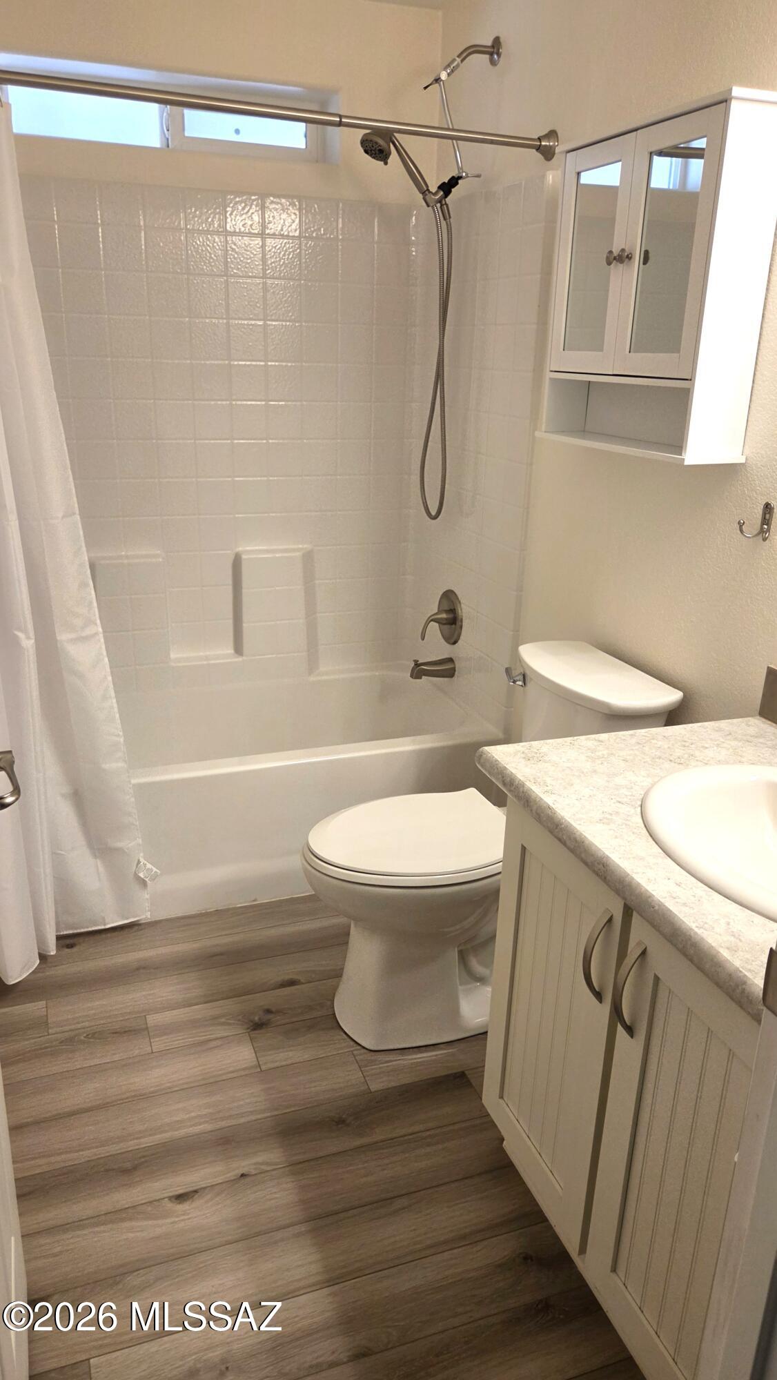 1030 Barrel Cactus Ridge, Unit 118 Benson, AZ 85602 - Photo 20 of 22 a bathroom with a sink a toilet and shower