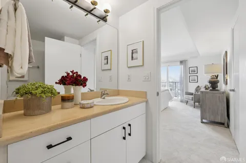 a bathroom with sink and mirror