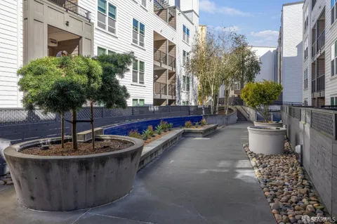 a view of a chairs and table in the patio