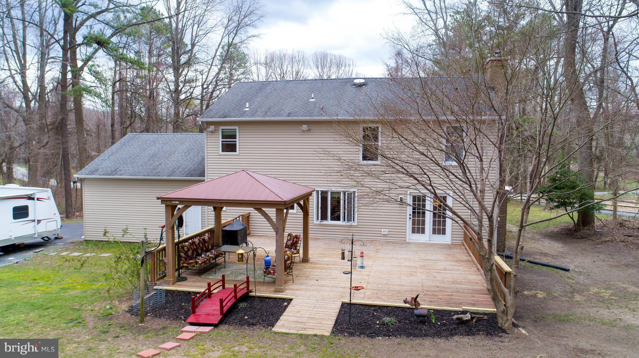 4230 Camp Kaufmann Road Huntingtown, MD 20639 - Photo 22 of 26 Huge deck-Lots of entertaining room