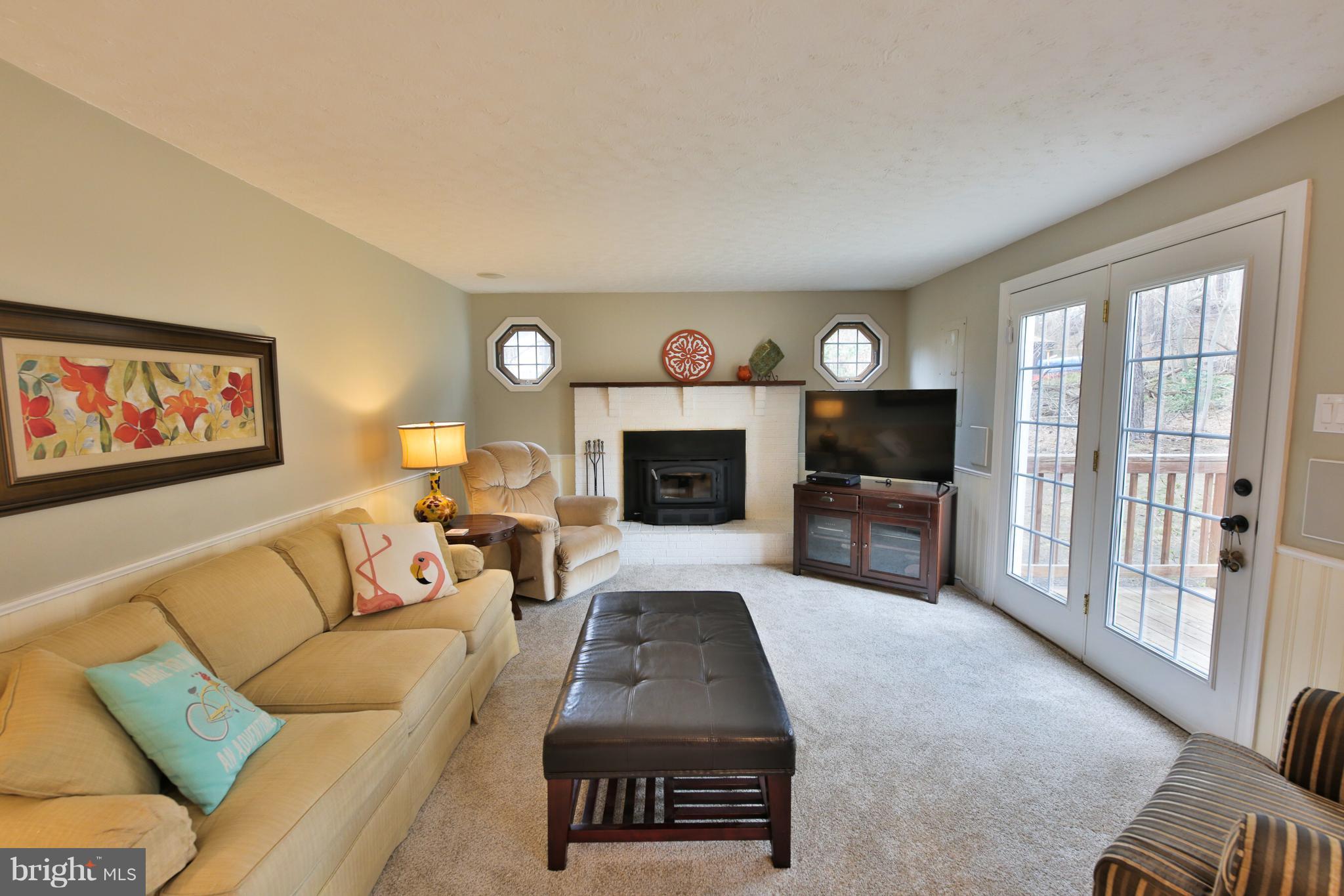 4230 Camp Kaufmann Road Huntingtown, MD 20639 - Photo 8 of 26 Family Room with wood burning stove