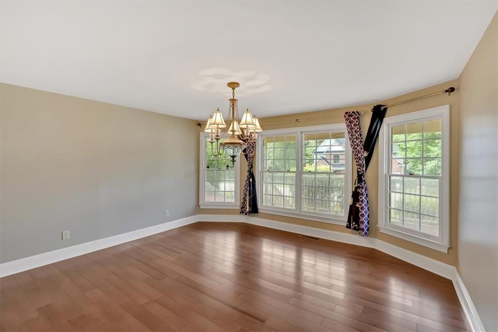 2 Stonebrook Drive Rome, GA 30165 - Photo 19 of 44 a view of a livingroom with wooden floor and a large window