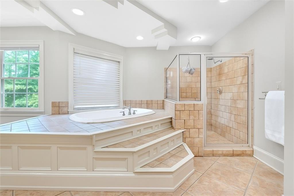 2 Stonebrook Drive Rome, GA 30165 - Photo 22 of 44 a bathroom with a tub shower and sink