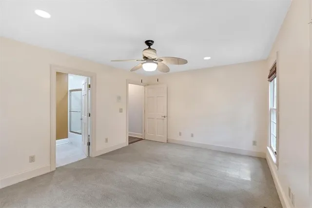 an empty room with a bathroom