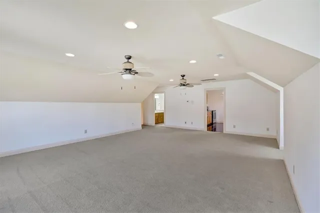 a bathroom with a sink a mirror and a shower
