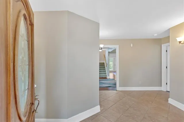 a bathroom with a sink toilet and a mirror