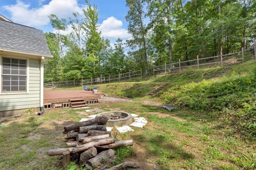 2 Stonebrook Drive Rome, GA 30165 - Photo 38 of 44 a backyard of a house with table and chairs