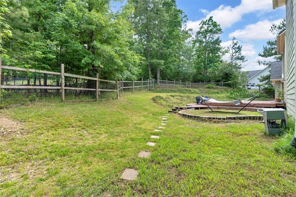 2 Stonebrook Drive Rome, GA 30165 - Photo 40 of 44 a view of a swimming pool with a yard