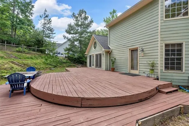 an aerial view of a house with swimming pool