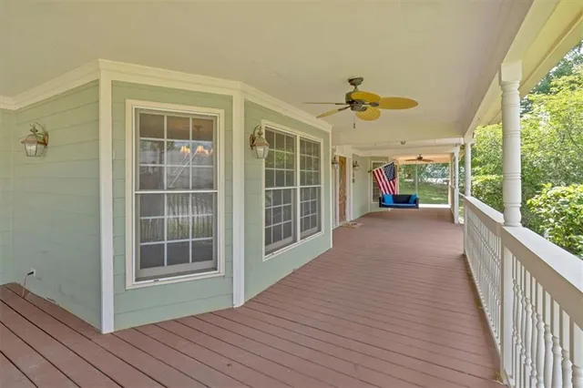 a view of a living room and a wooden floor