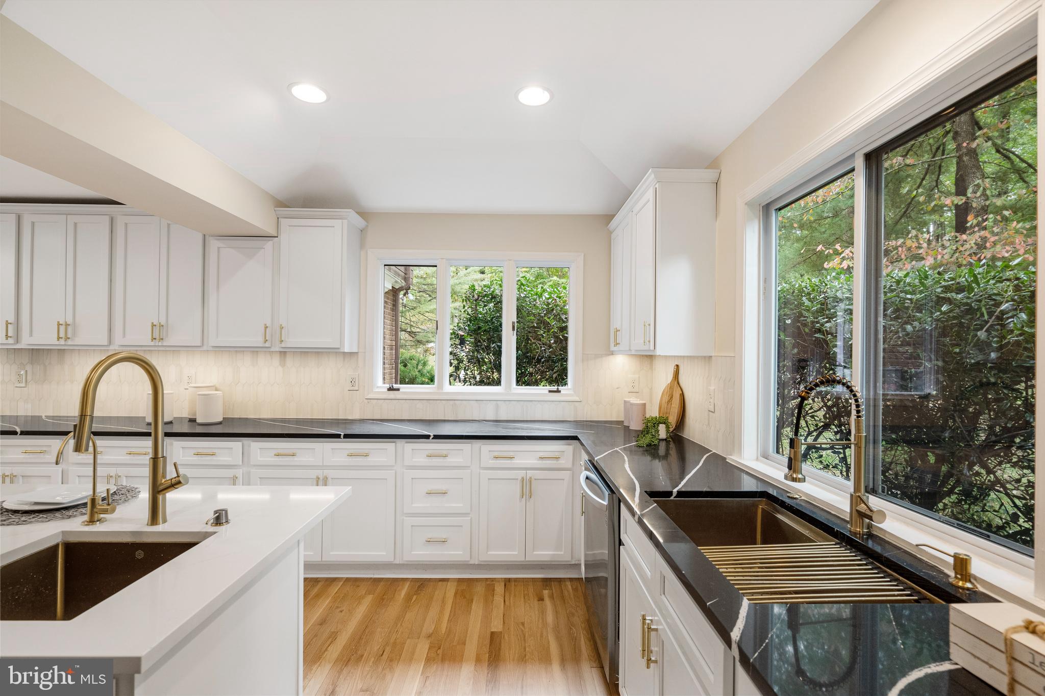 4 Bucksway Road Owings Mills, MD 21117 - Photo 14 of 57 a kitchen with granite countertop a sink a counter space and stainless steel appliances