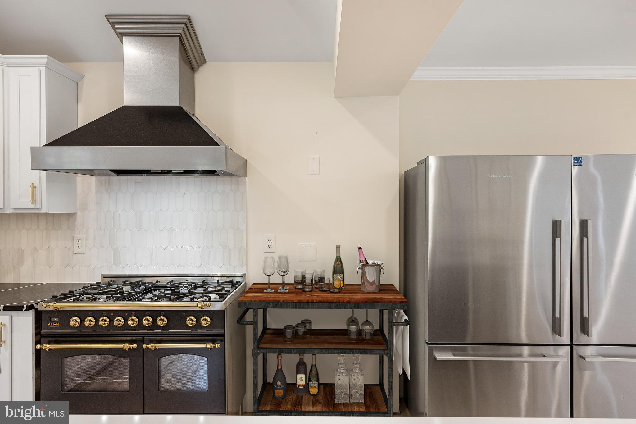 4 Bucksway Road Owings Mills, MD 21117 - Photo 16 of 57 a kitchen with stainless steel appliances granite countertop a stove a refrigerator and a stove