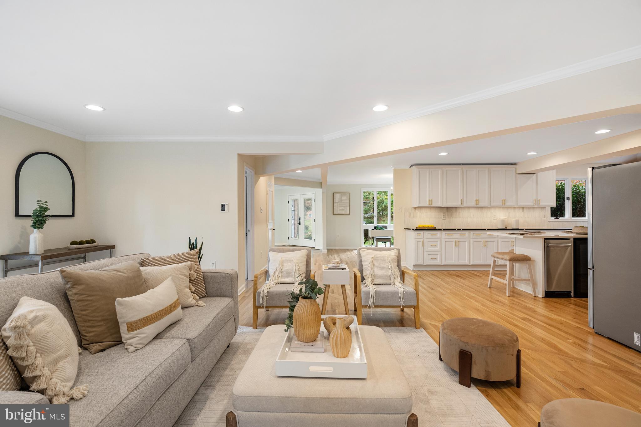4 Bucksway Road Owings Mills, MD 21117 - Photo 20 of 57 a living room with furniture white walls and kitchen view