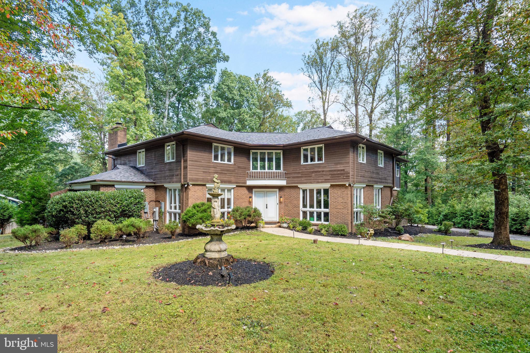 4 Bucksway Road Owings Mills, MD 21117 - Photo 2 of 57 a front view of a house with a yard