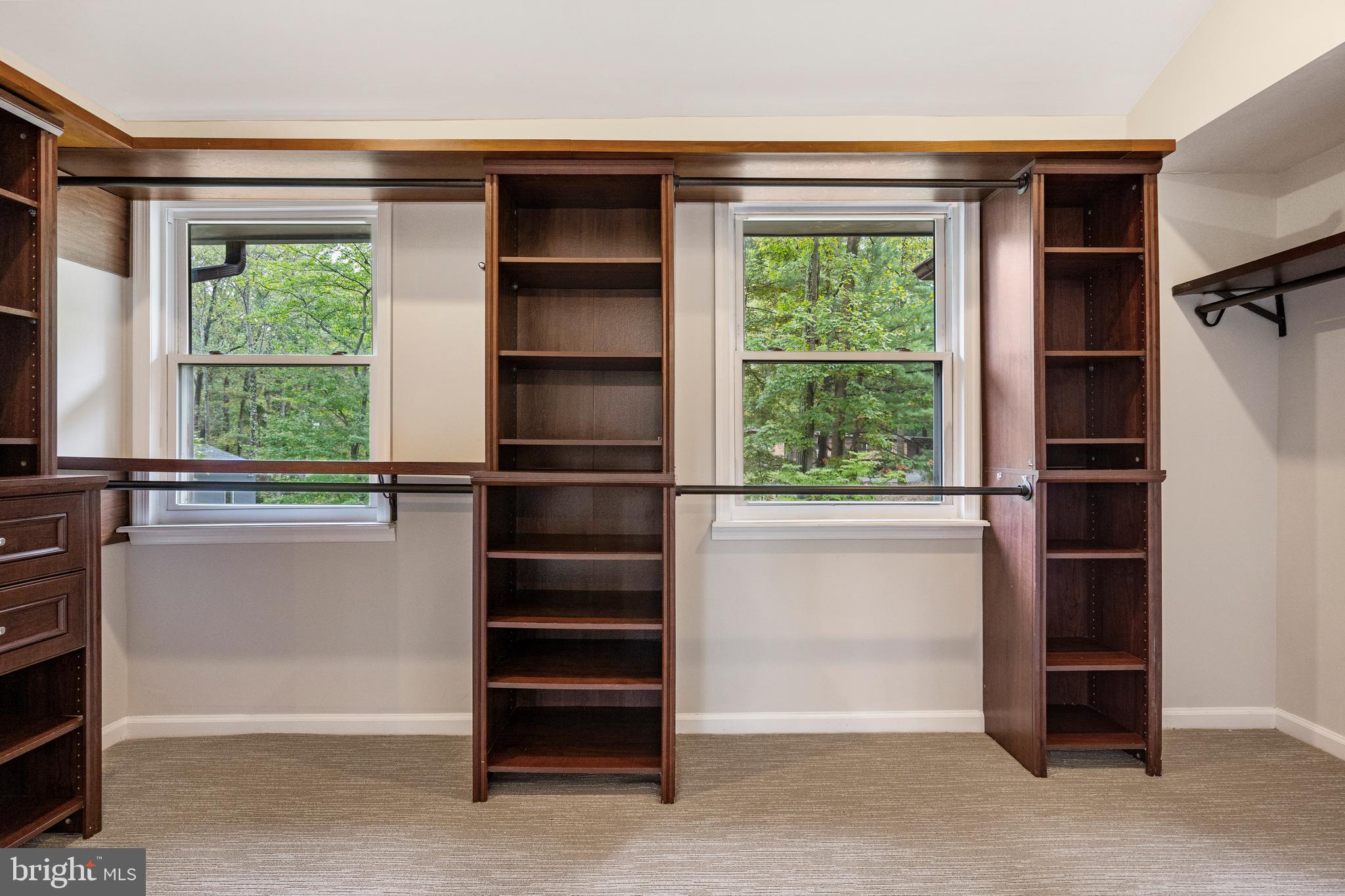 4 Bucksway Road Owings Mills, MD 21117 - Photo 28 of 57 a view of walk in closet with clothes and shoes