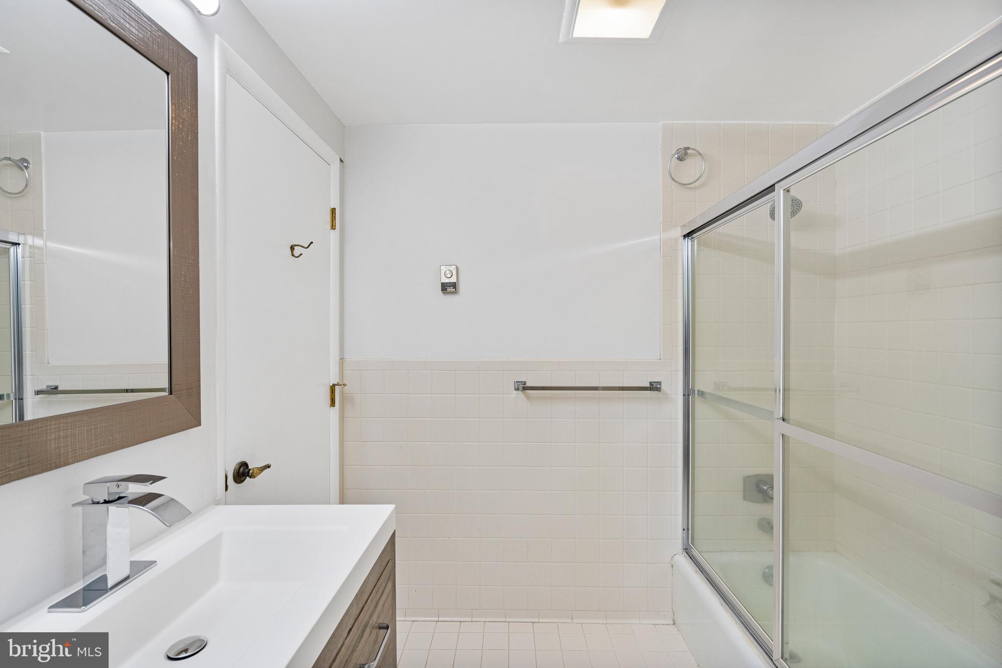 4 Bucksway Road Owings Mills, MD 21117 - Photo 34 of 57 a bathroom with a sink and a shower