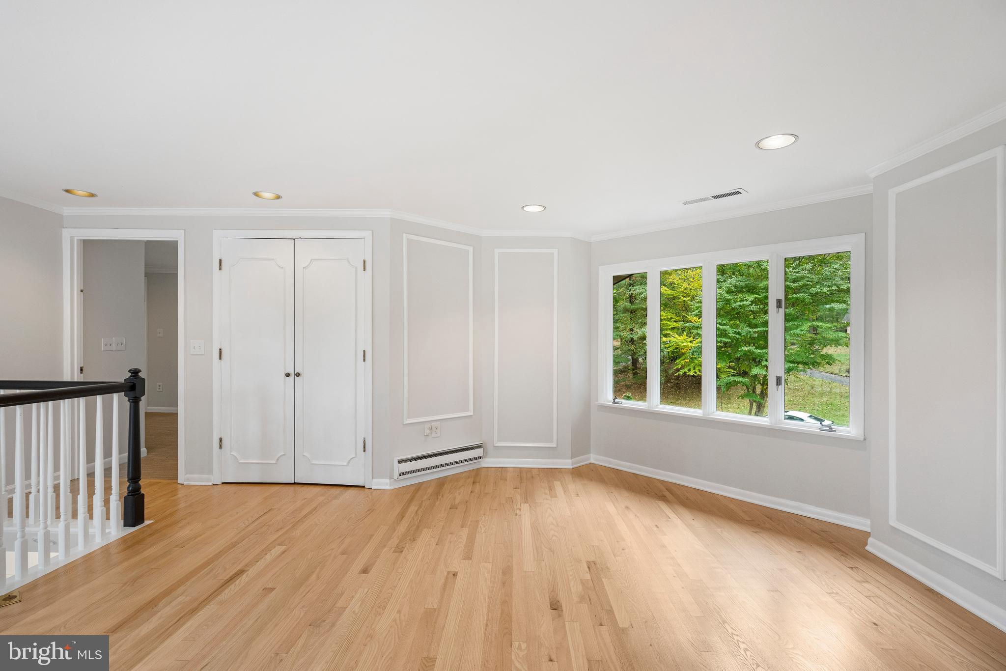 4 Bucksway Road Owings Mills, MD 21117 - Photo 40 of 57 a view of empty room with wooden floor and fan