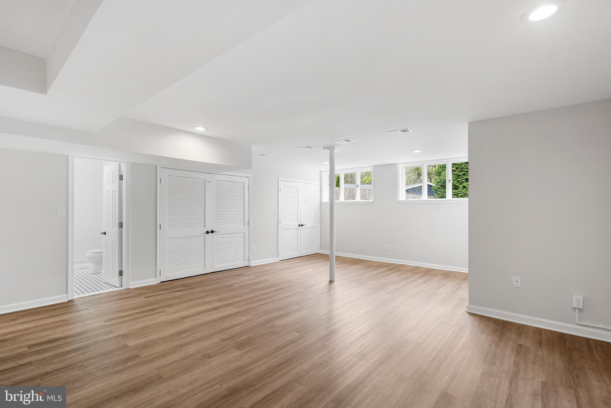 4 Bucksway Road Owings Mills, MD 21117 - Photo 41 of 57 an empty room with wooden floor and windows