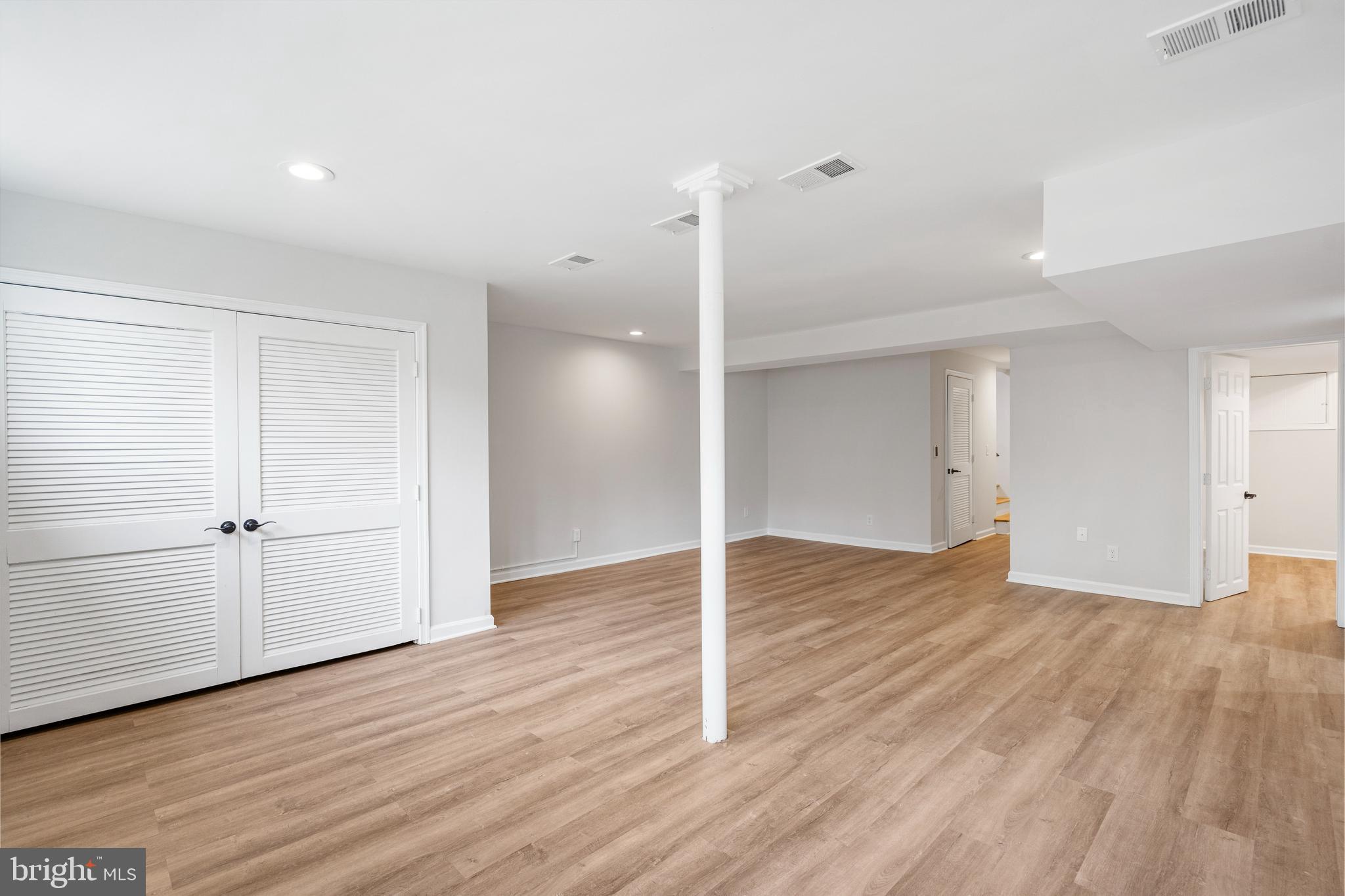 4 Bucksway Road Owings Mills, MD 21117 - Photo 43 of 57 a view of an empty room with wooden floor