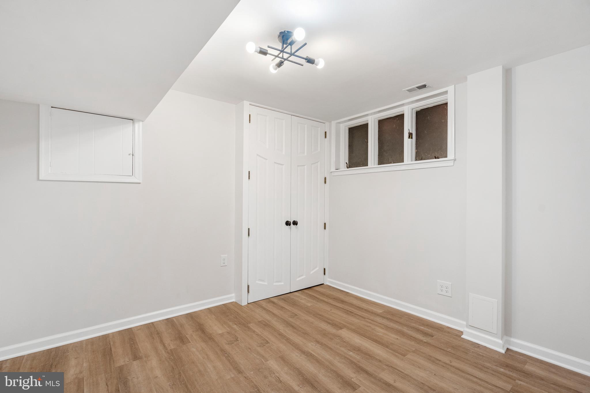4 Bucksway Road Owings Mills, MD 21117 - Photo 44 of 57 a view of an empty room with closet and a window