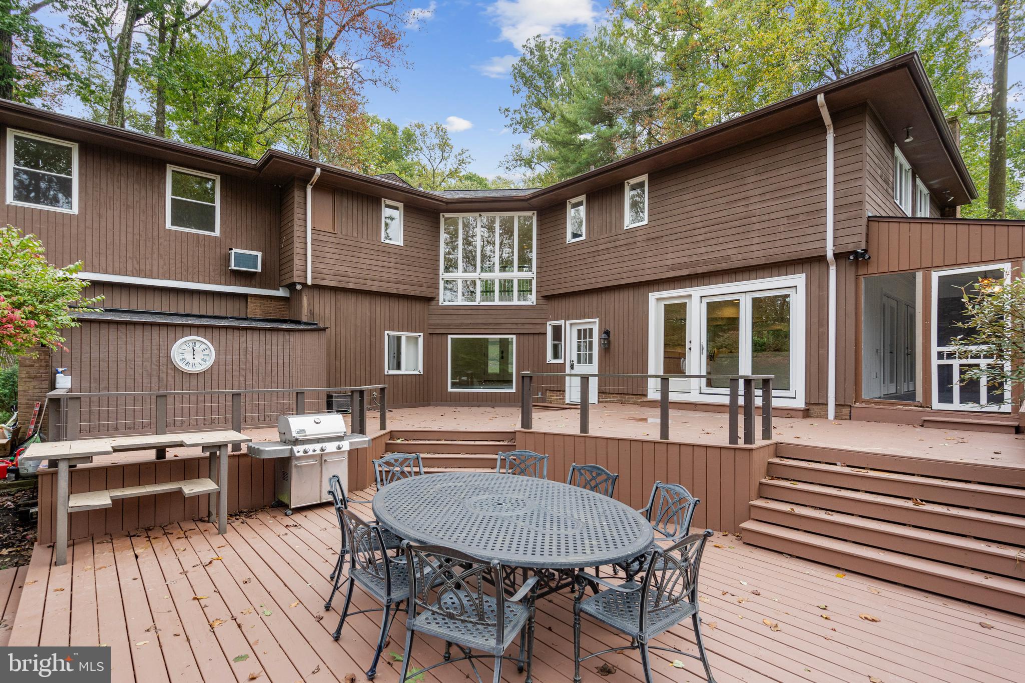 4 Bucksway Road Owings Mills, MD 21117 - Photo 49 of 57 a view of a patio with table and chairs and wooden floor