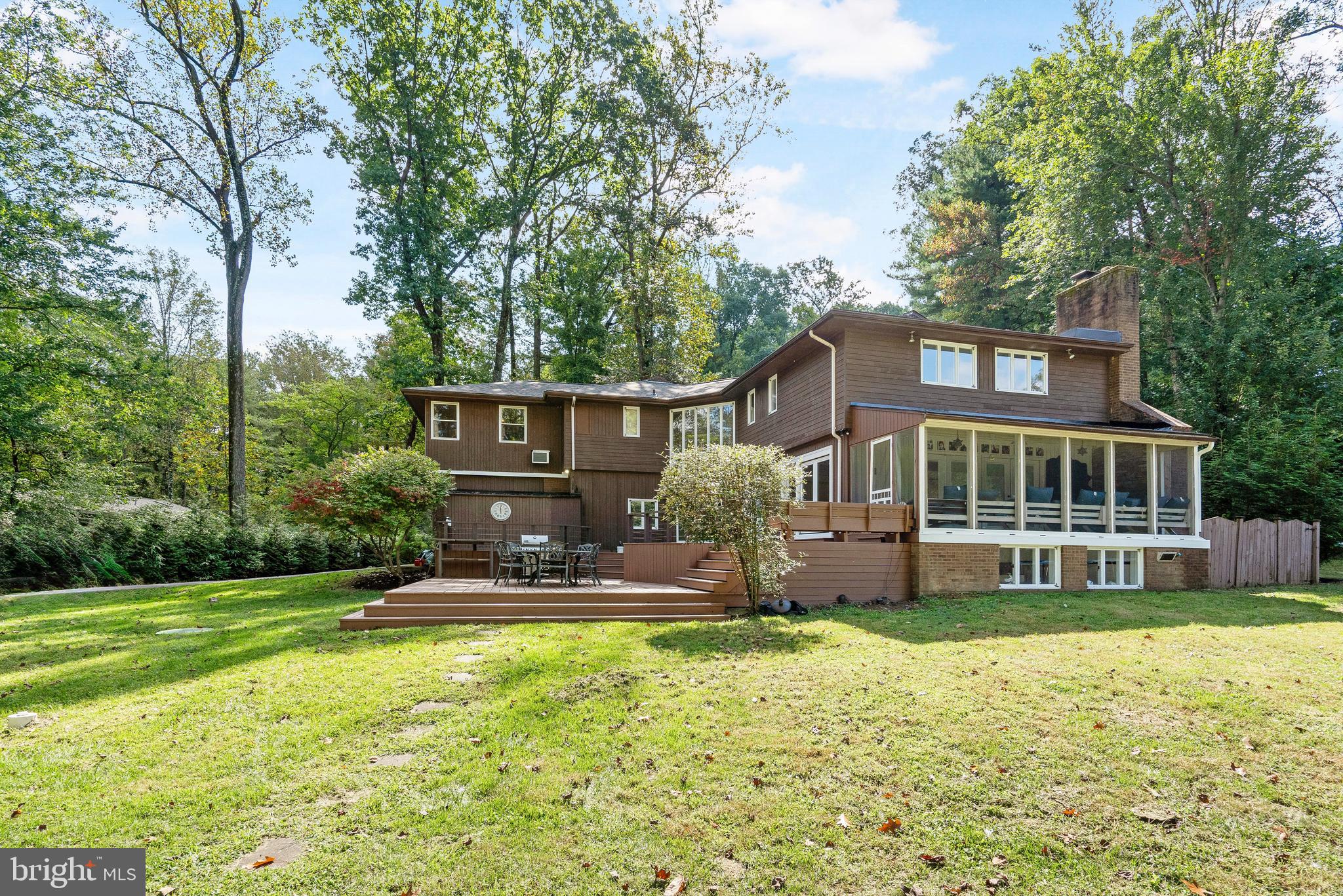 4 Bucksway Road Owings Mills, MD 21117 - Photo 55 of 57 a front view of a house with a yard table and chairs