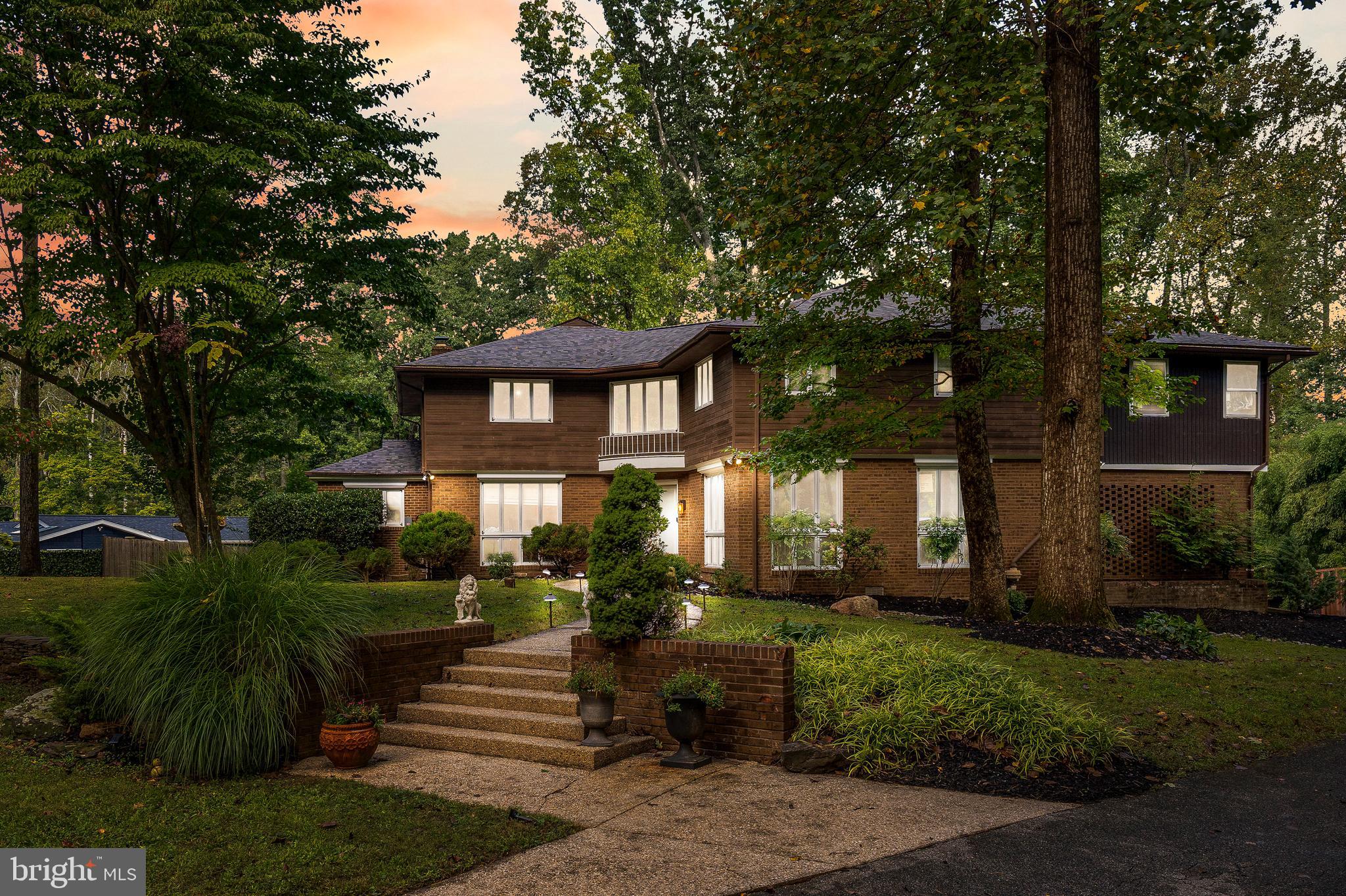 4 Bucksway Road Owings Mills, MD 21117 - Photo 57 of 57 a front view of a house with a garden