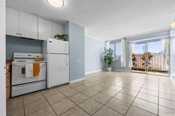 a view of a kitchen with washer and dryer