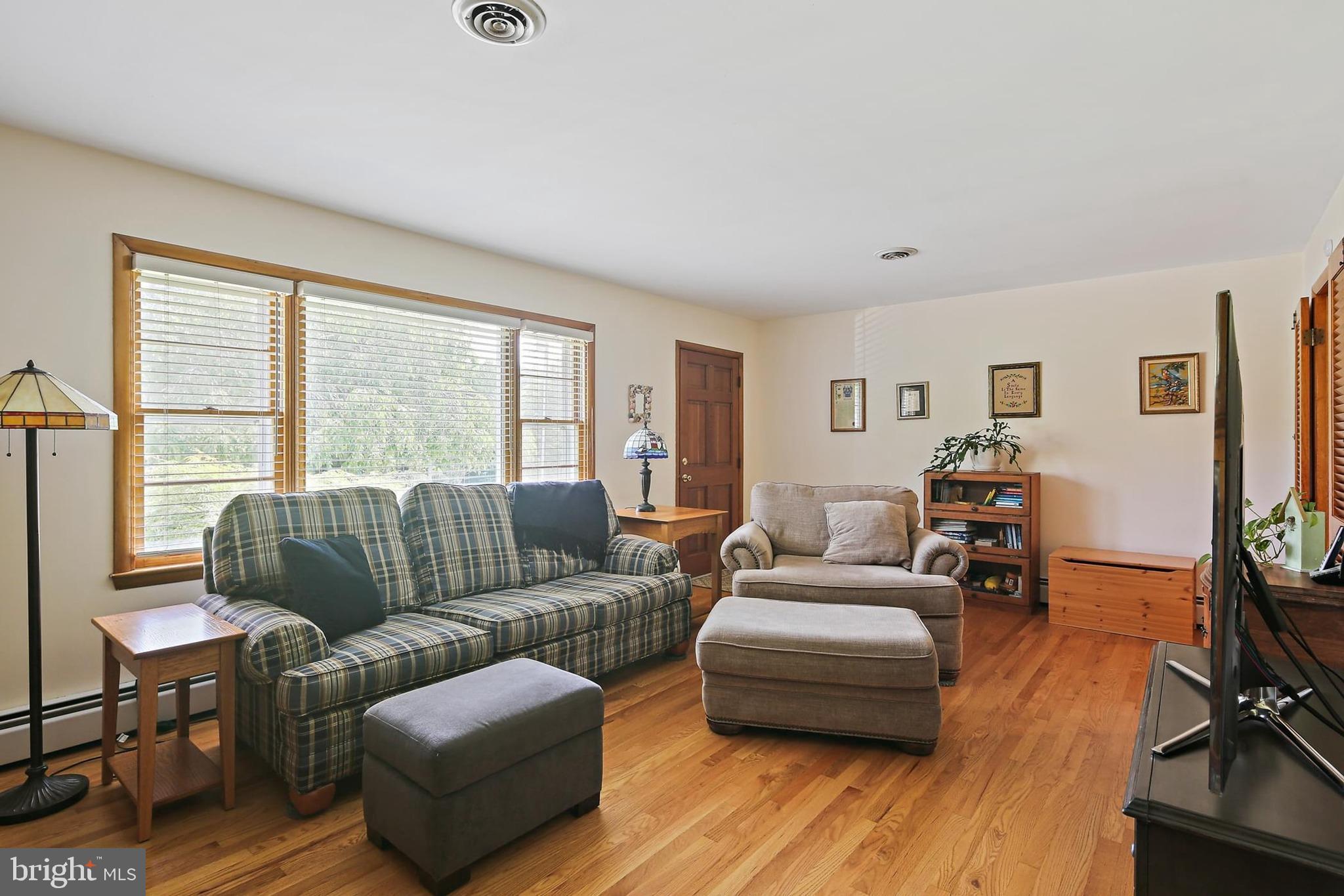 2114 Ruffs Mill Road Bel Air, MD 21015 - Photo 8 of 36 Spacious living room with gleaming hardwood floors