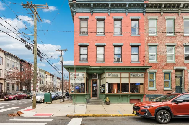 a front view of a building and a street