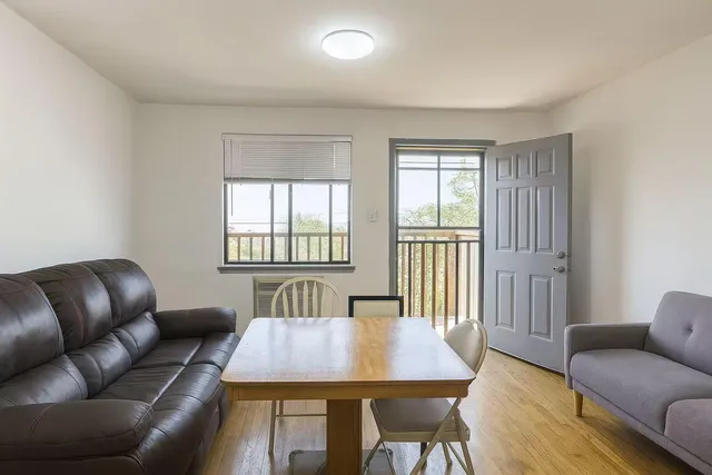 a view of a livingroom with furniture and window