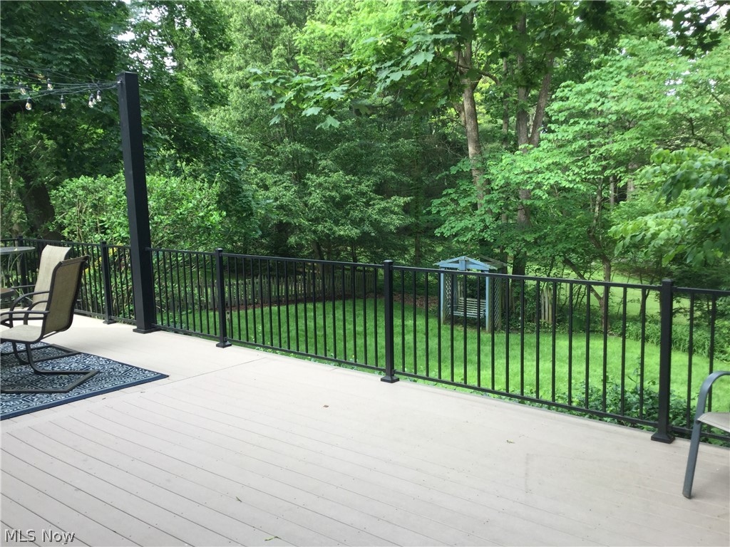 1560 Burbank Road Wooster, OH 44691 - Photo 3 of 20 Classic railings have been installed to add to the ambiance from the deck.