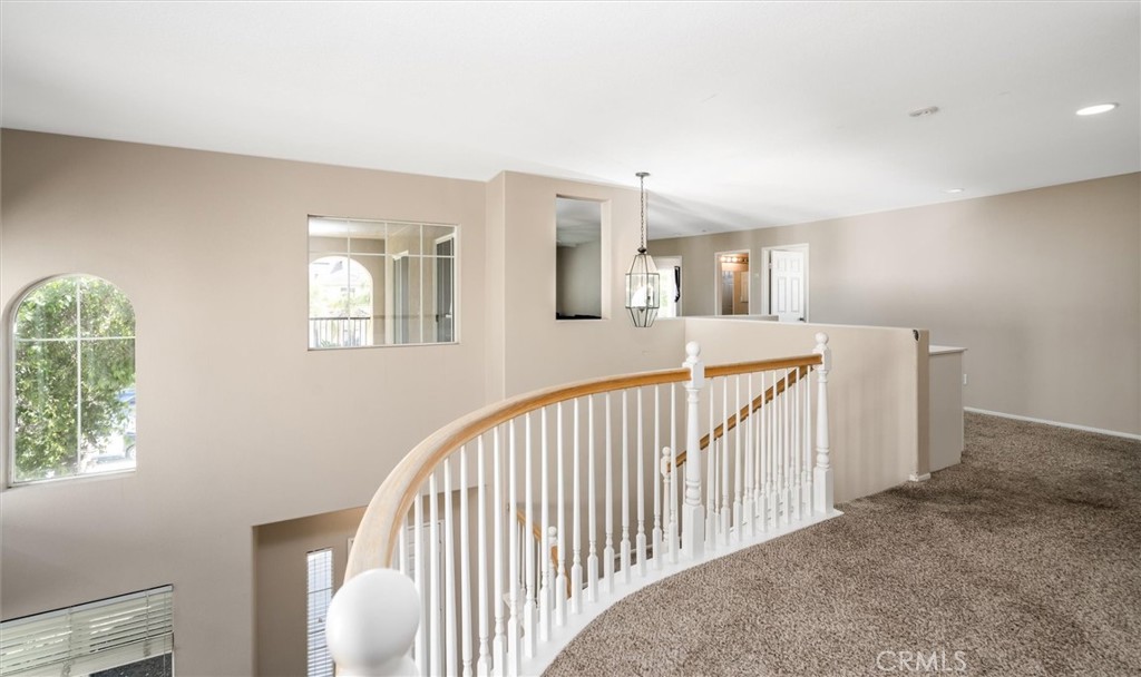 37867 Shady Maple Road Murrieta, CA 92563 - Photo 19 of 68 a view of a hallway with windows