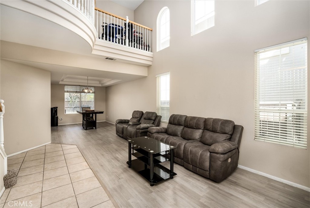 37867 Shady Maple Road Murrieta, CA 92563 - Photo 3 of 68 a living room with furniture and wooden floor