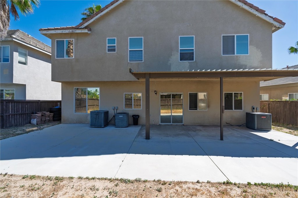37867 Shady Maple Road Murrieta, CA 92563 - Photo 51 of 68 a view of a livingroom with furniture and a fireplace