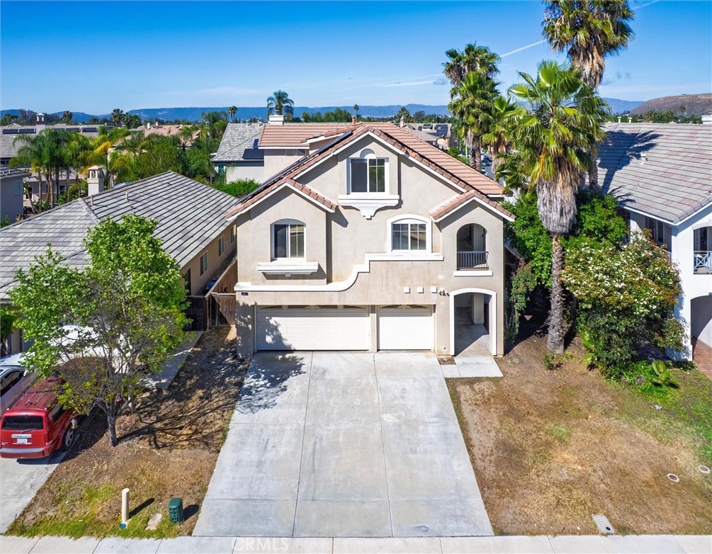37867 Shady Maple Road Murrieta, CA 92563 - Photo 65 of 68 a view of a house with a yard