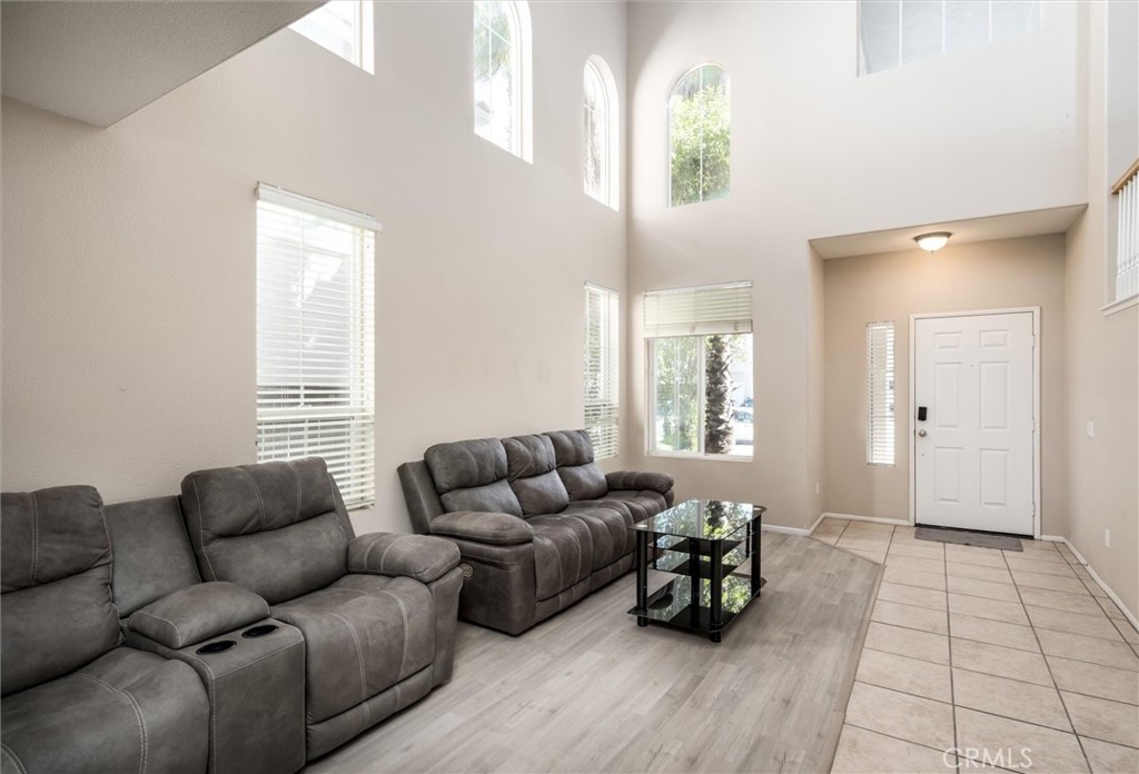37867 Shady Maple Road Murrieta, CA 92563 - Photo 7 of 68 a living room with furniture and a window